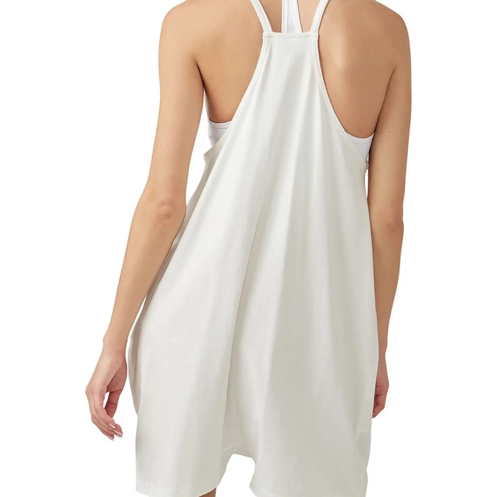 FREE PEOPLE MOVEMENT onesie in white.